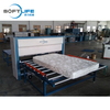 MATTRESS COVERING MACHINE