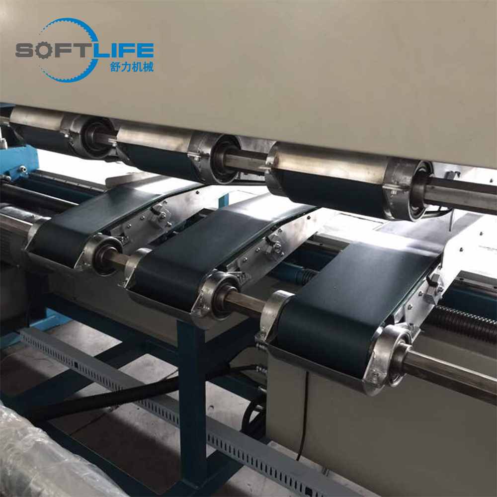 MATTRESS COVERING MACHINE